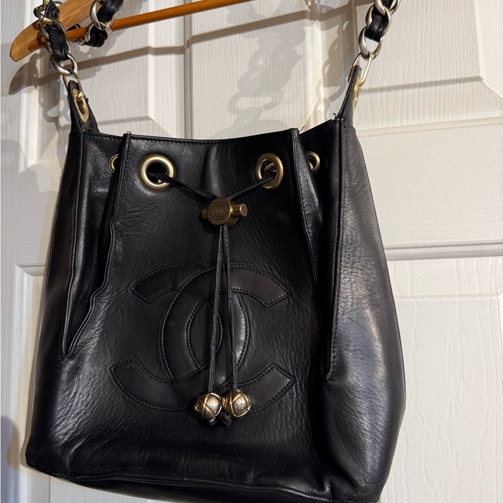 Chanel vintage Black Leather Designer Bucket Bag purse Chanel selling as is